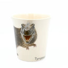 Ceramic mug with a T-Rex design on a white background