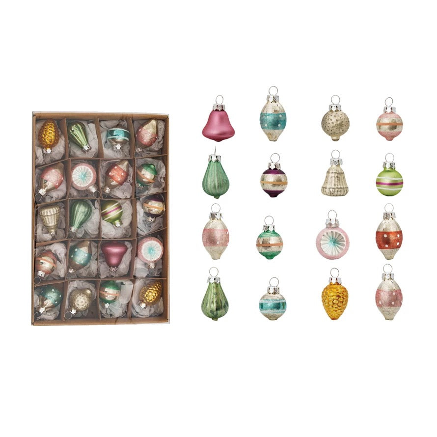 Set of colorful Christmas ornaments with a box on a white background