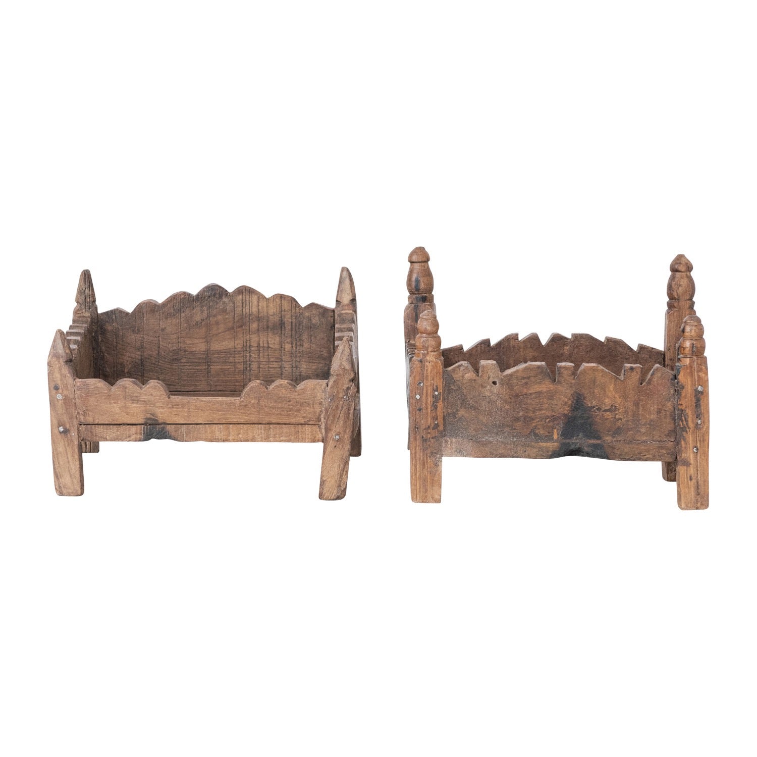 Two wooden planters with decorative tops on a white background