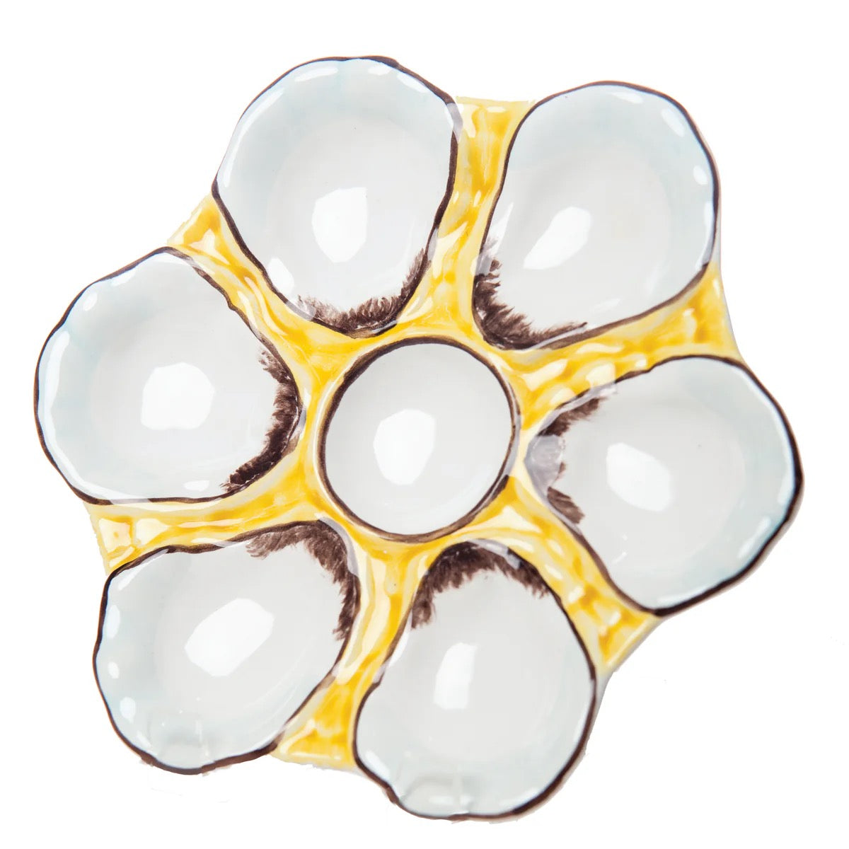 Ceramic egg tray with yellow border and white interior on a white background