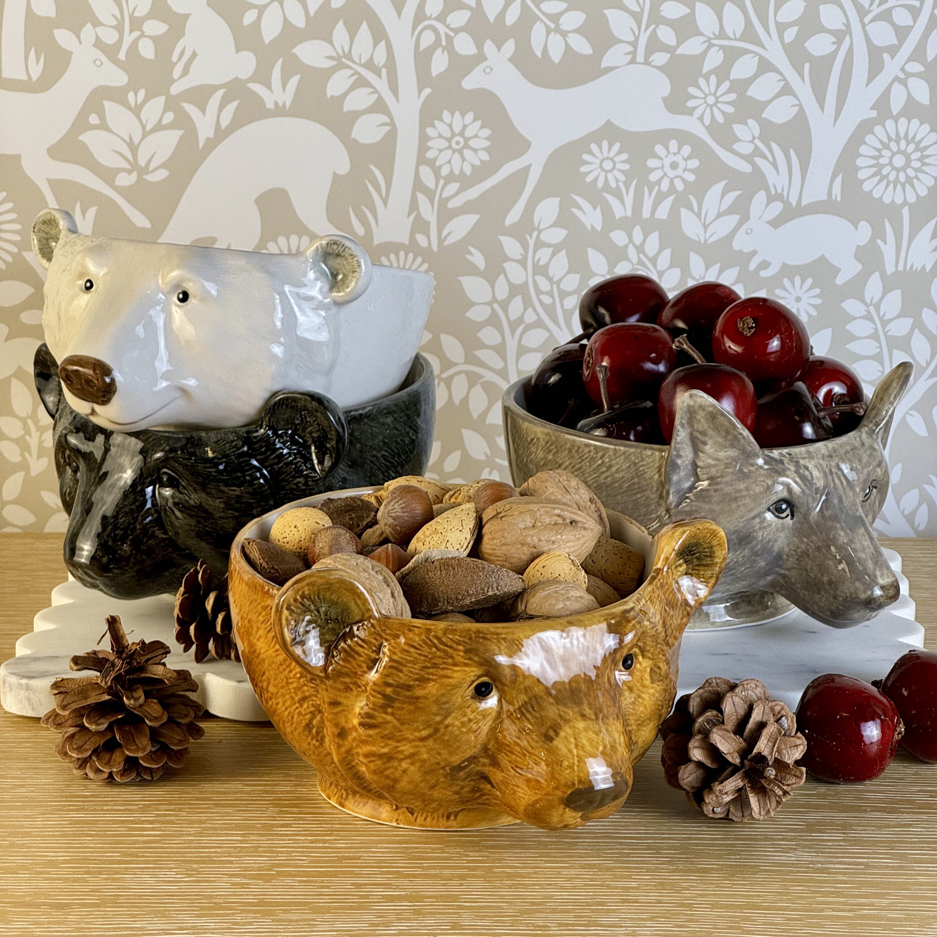 Unique seasonal fall decor like the animal head bowls in this photo