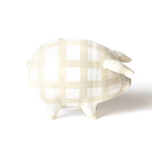 White ceramic piggy bank with a textured surface on a white background