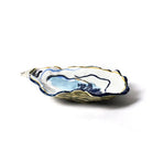 Decorative ceramic dish with blue and gold accents on a white background