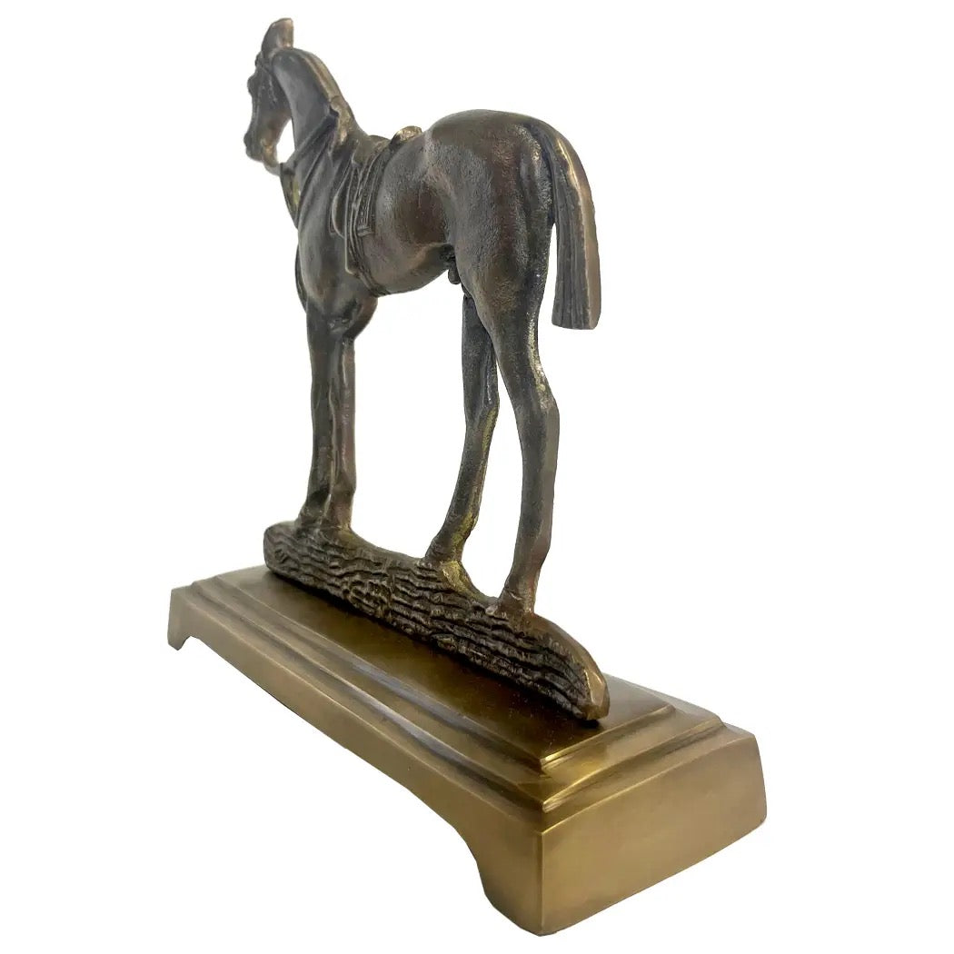Bronze horse statue on a rectangular base against a white background