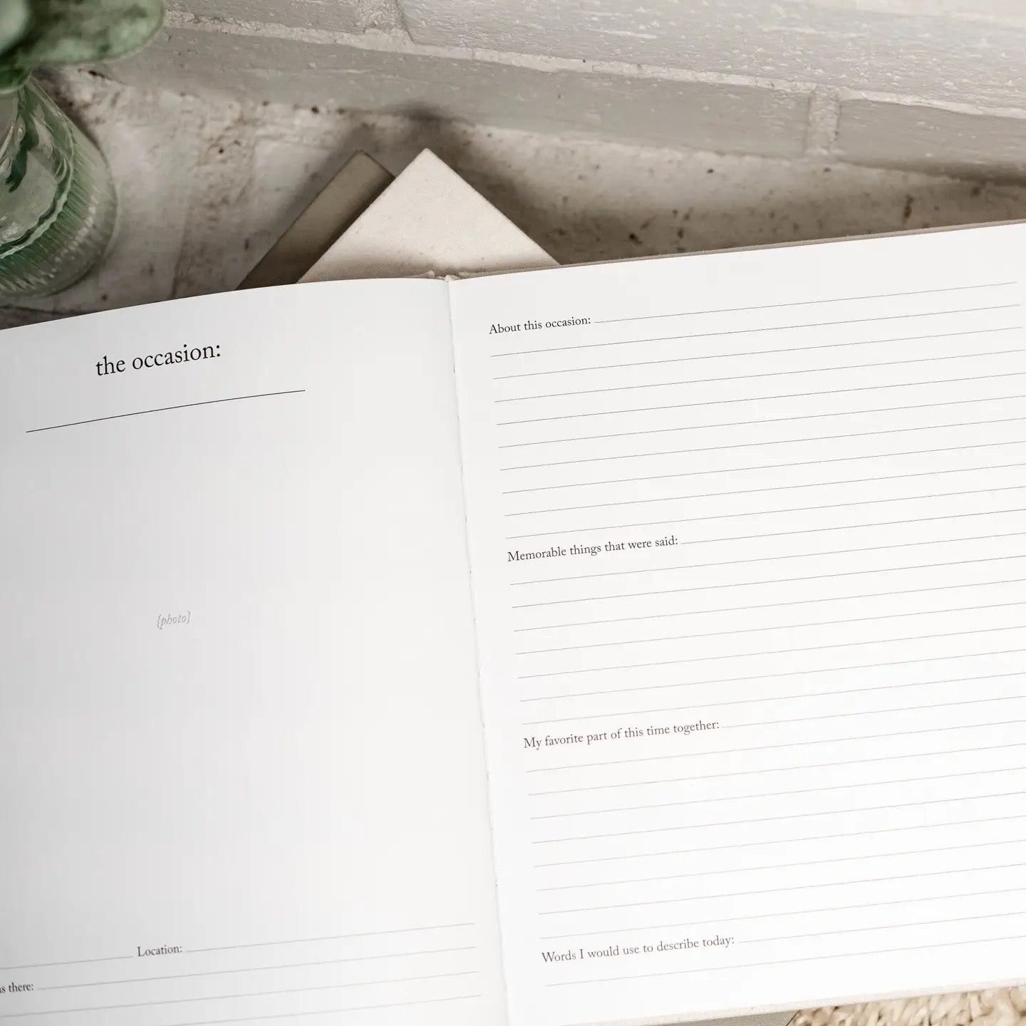 Open book with lined pages on a textured surface
