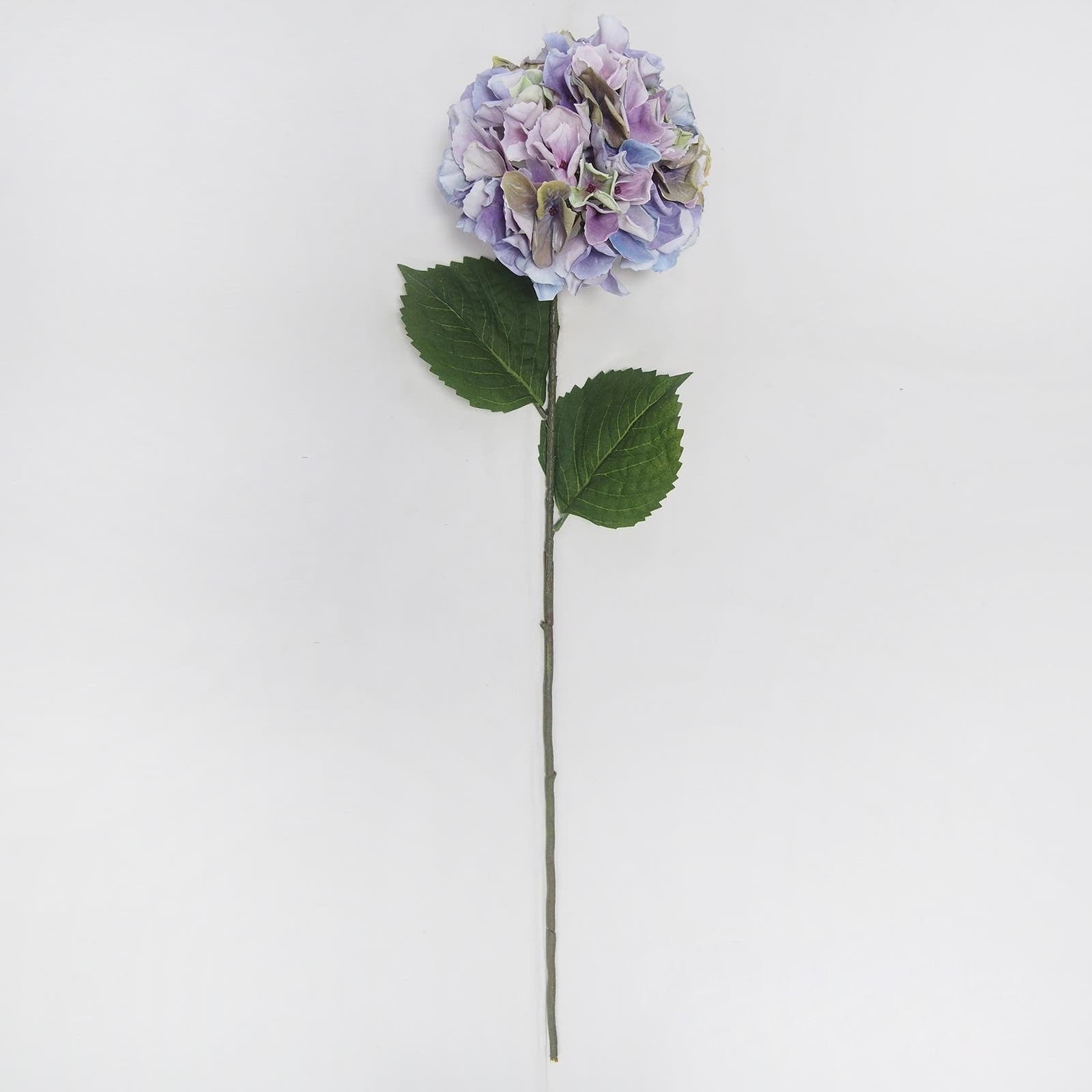 Artificial flower stem with purple and green leaves on a white background