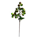 Artificial green berry branch on a white background
