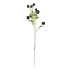 Artificial plant stem with black thistle flowers on a white background