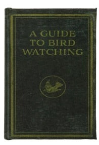 Book titled 'A Guide to Bird Watching' with a green cover and gold text.