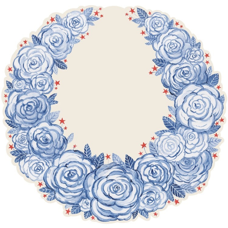 Decorative plate with blue floral design on a beige background