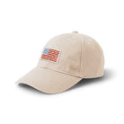 Beige cap with an American flag patch on a white background