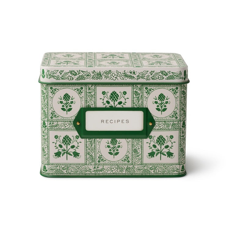 Decorative recipe box with green and white pattern on a white background
