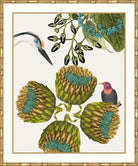 A framed botanical art print featuring four green artichokes with blue-green centers, a heron's head in the upper left, blue flowers and leaves at the top right, and a small bird perched on one artichoke. The print is set within a white mat and a gold-toned bamboo-style frame.