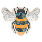 Decorative plate shaped like a bee with floral patterns on a white background