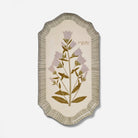 Decorative wall art with floral design on a beige background