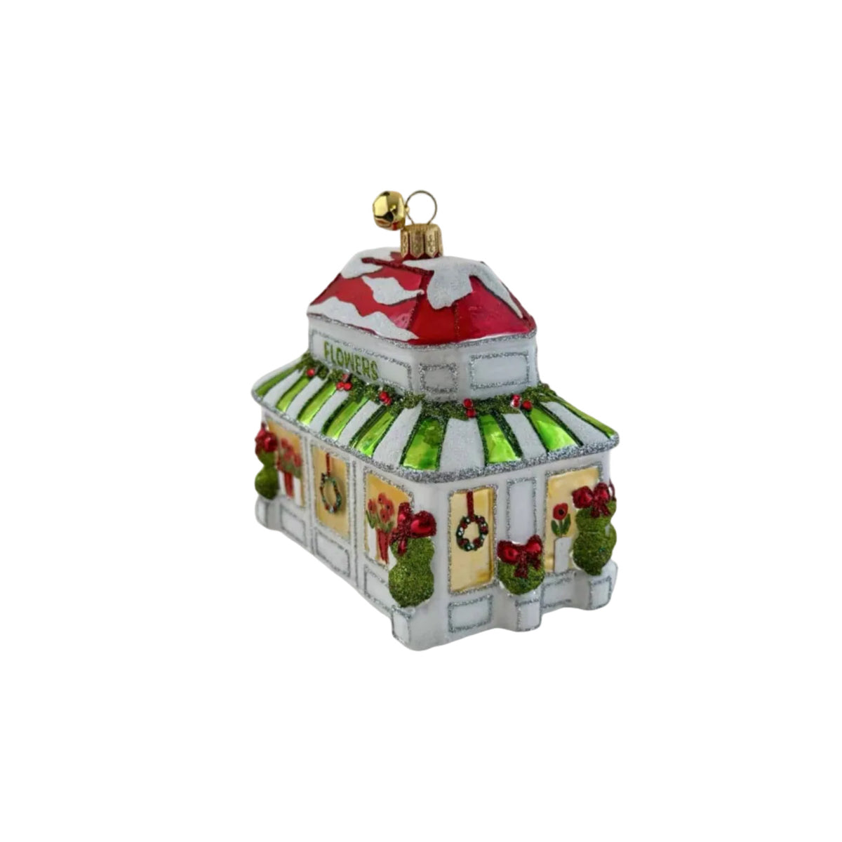 A decorative Christmas ornament shaped like a small flower shop. The ornament has a white facade with green striped awning, red roof, and festive greenery and wreaths.