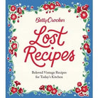 Front cover of the book 'Lost Recipes' by Betty Crocker, featuring a cream background with red script title text, a blue border, and red floral illustrations with green leaves around the edges.