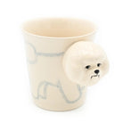 Ceramic mug with a dog design on a white background