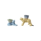 Two ceramic animal figures with planters on a white background