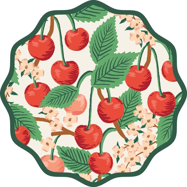 Decorative plate with cherries and leaves on a white background