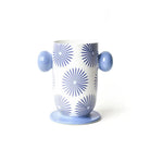 Cylindrical container with blue sunburst pattern and light blue handles on a white background