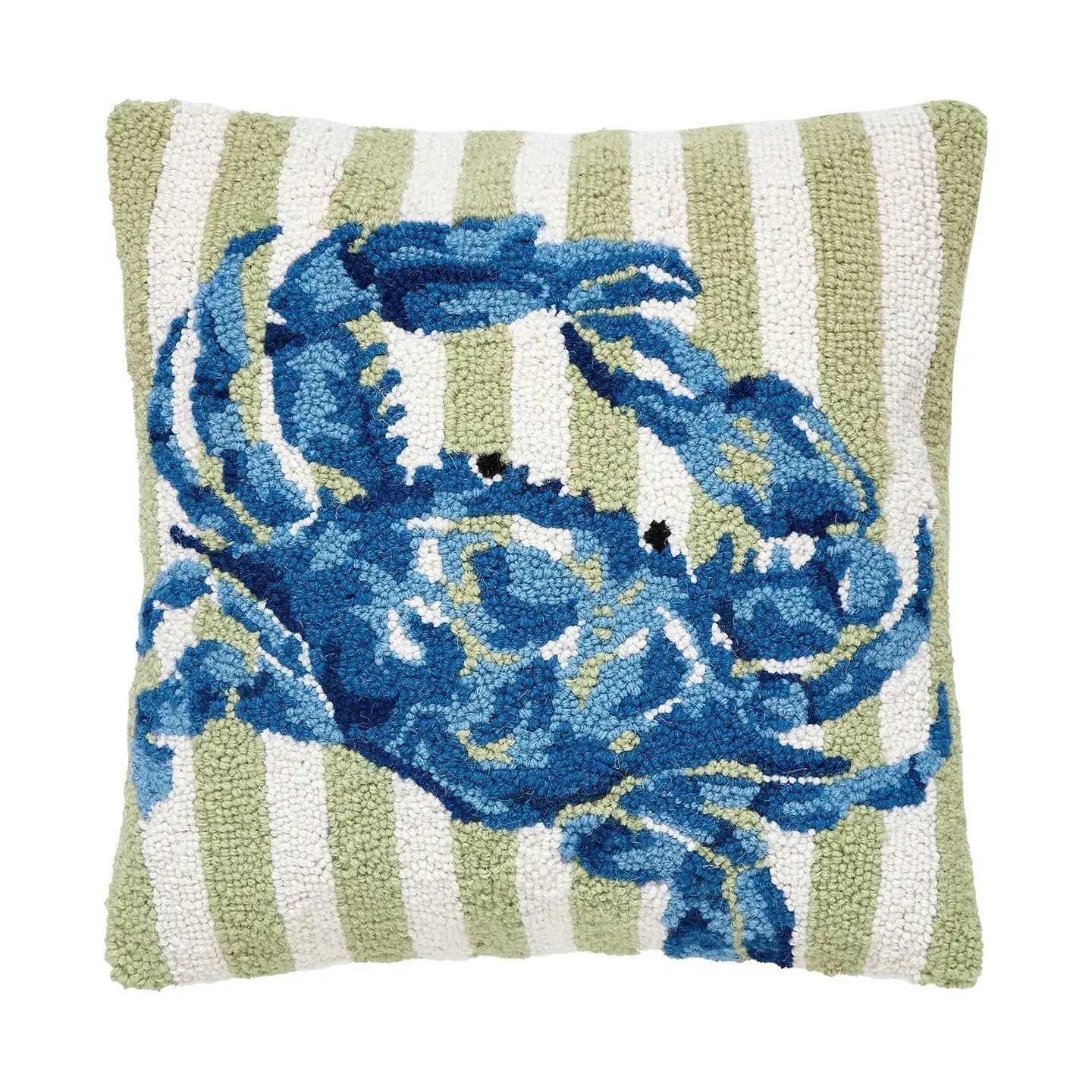 Pillow with a blue crab design on a green and white striped background