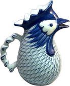 Ceramic rooster with blue and white design on a white background