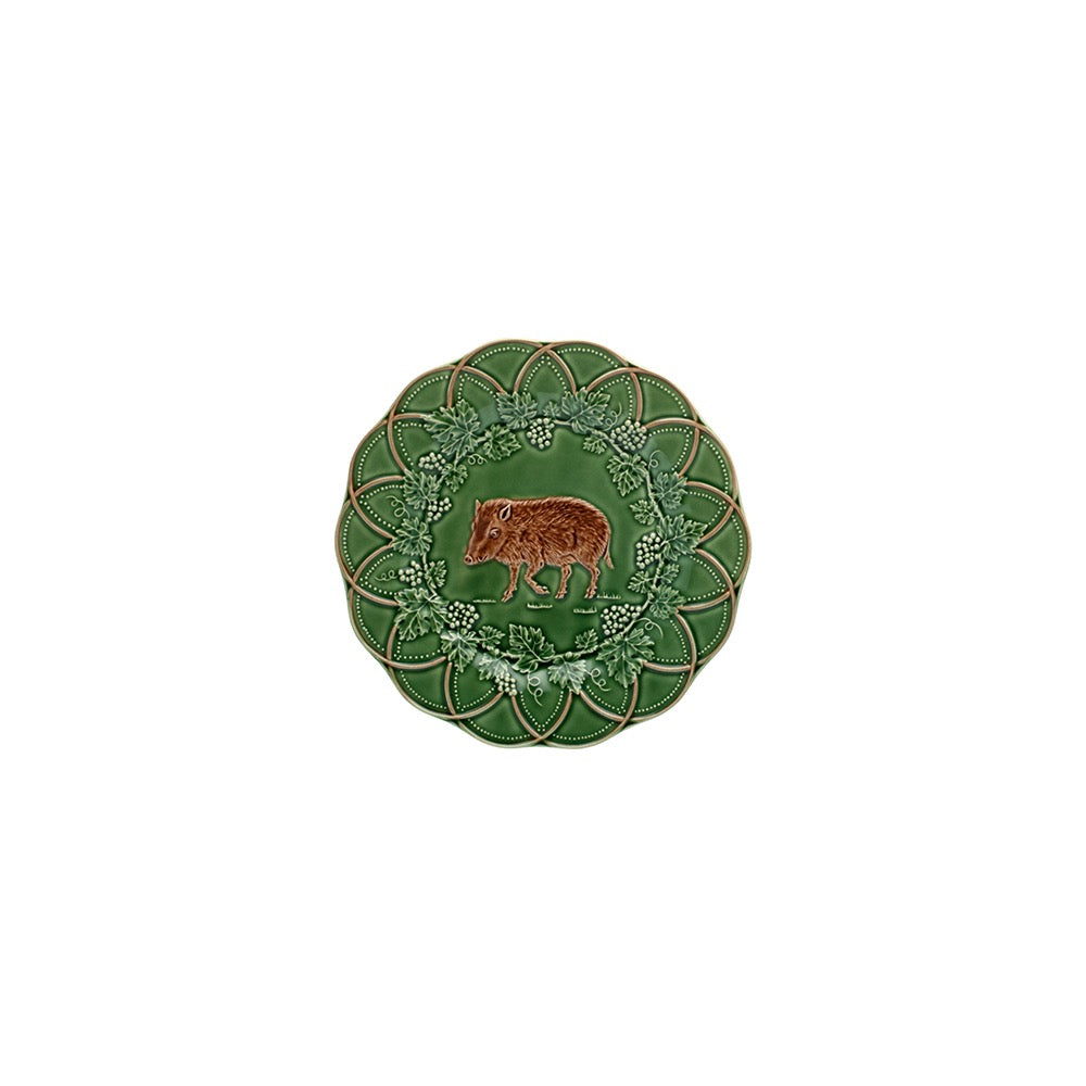 Decorative plate with a boar design on a green background