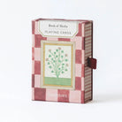 Playing cards box with herb design and 'Roomytown' branding on a white background