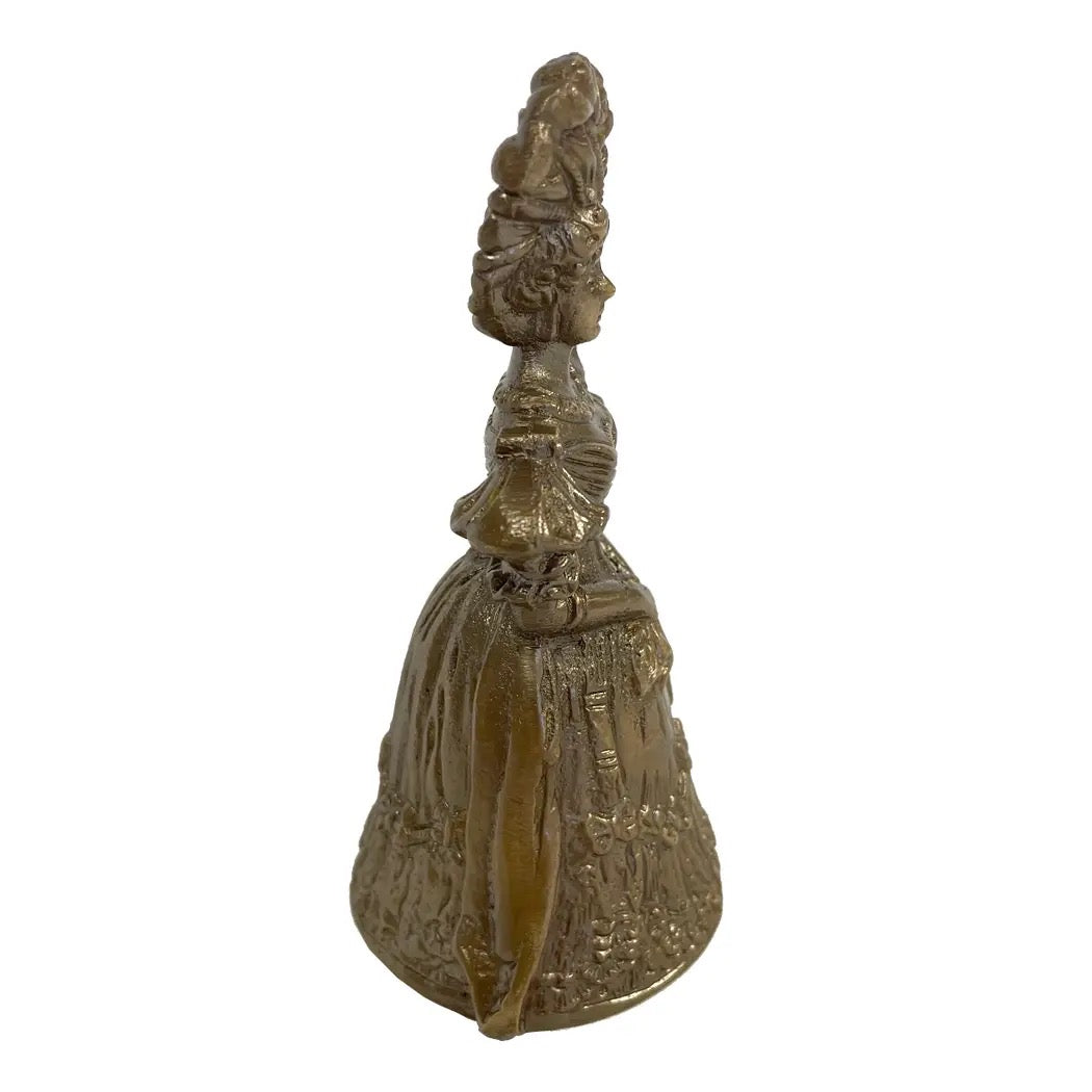 Decorative bell with intricate design on a white background