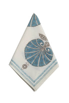 Decorative napkin with blue and gray floral pattern on a white background