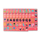 Set of colorful tiles with various symbols on a pink background