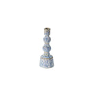A small ceramic candlestick holder with a blue and white speckled glaze and subtle gold detailing, centered on a plain white background.