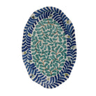 Add the Oval Hand-Painted Stoneware Platter with Vines Design to home décor for a refined blend of artistry and function. This oval platter features a hand-painted vines motif in multicolor tones, highlighting artisanal craftsmanship and rustic charm. Perfect for Contemporary, Casual, Farmhouse, French Country, and Cottagecore interiors, it serves as a versatile piece for serving appetizers, desserts, or as a decorative centerpiece.