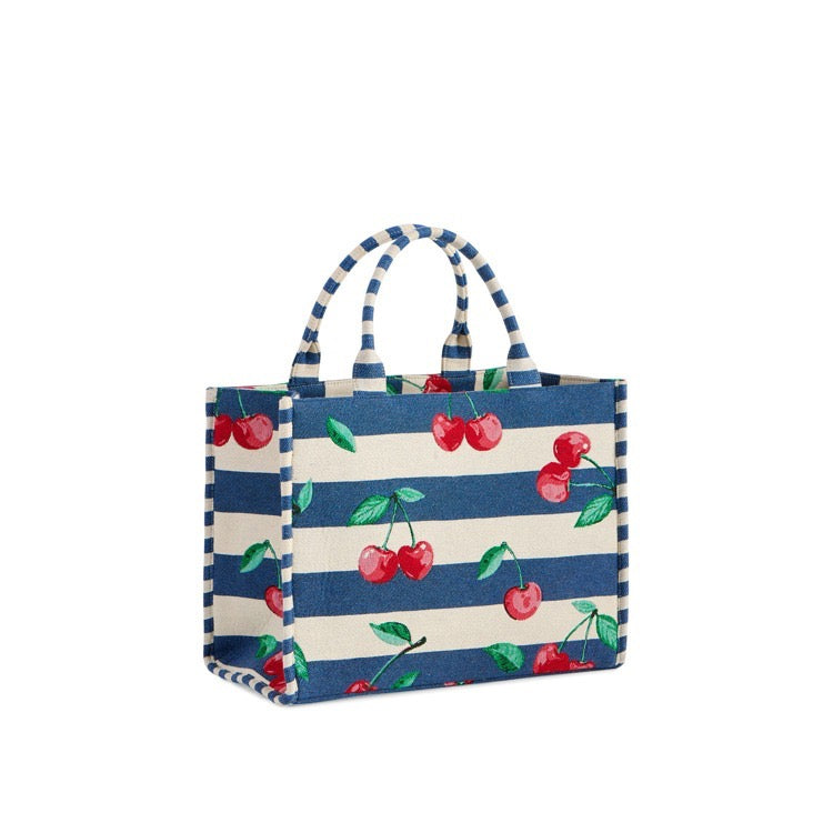 Tote bag with cherry pattern on a white background