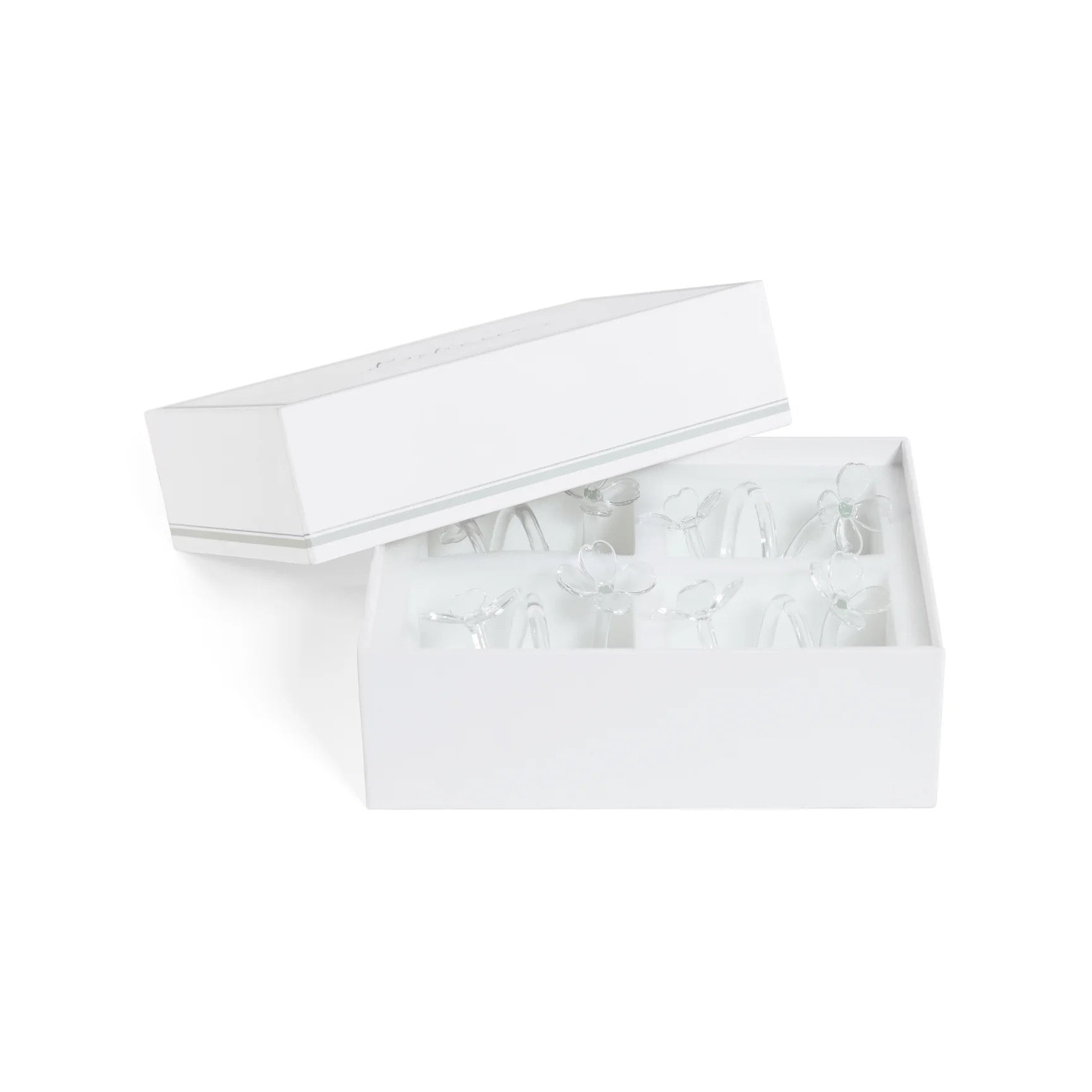 White lace bralette in a box on a white background