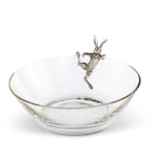 Clear glass bowl with a silver deer figurine on a white background