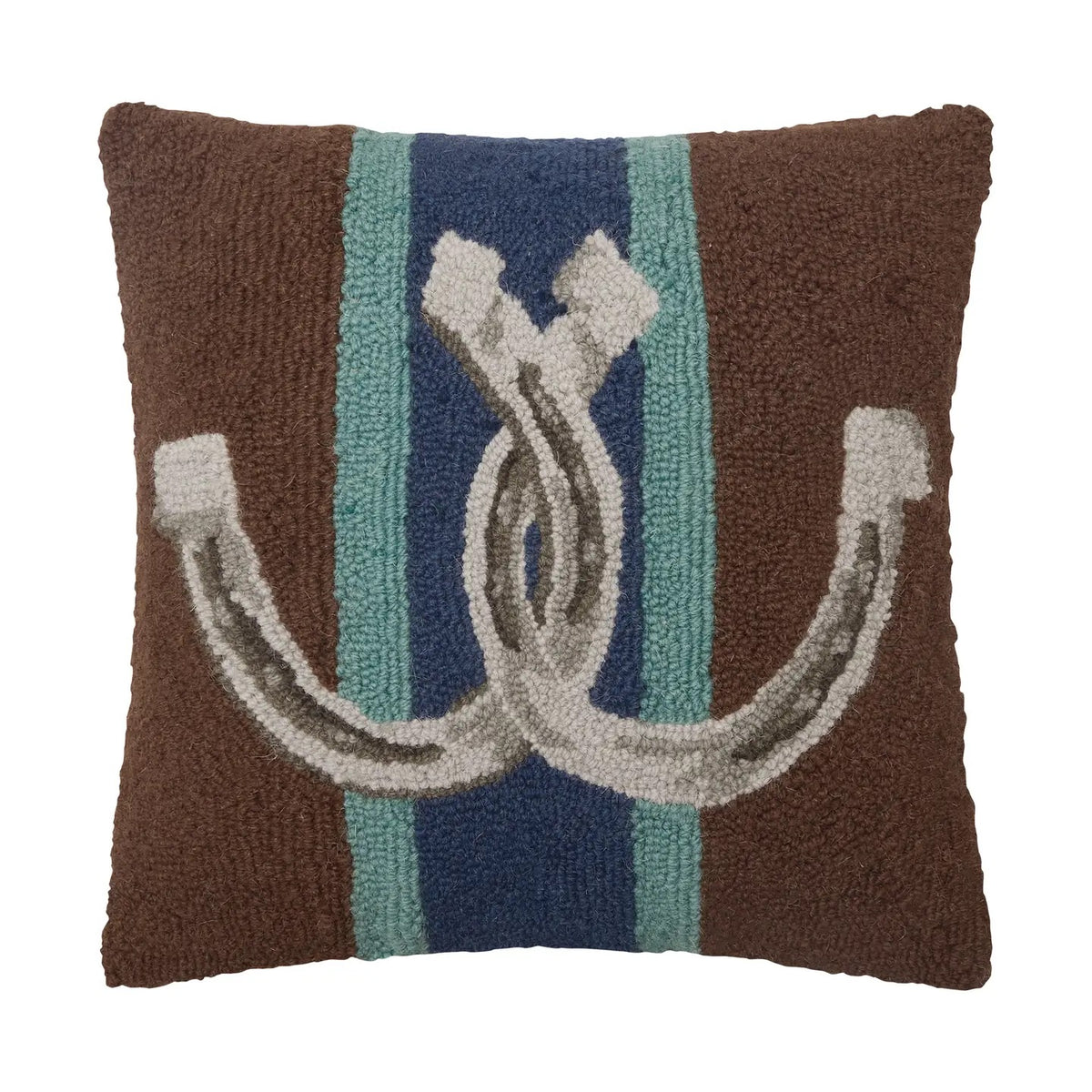 A square brown textured throw pillow featuring a central design with vertical teal and navy stripes and a large white horseshoe motif.