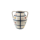 Ceramic vase with floral patterns and grid design on a white background