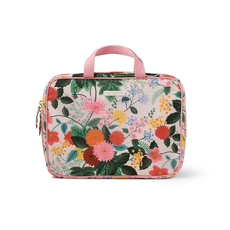 Floral-patterned cosmetic bag with a pink handle on a white background