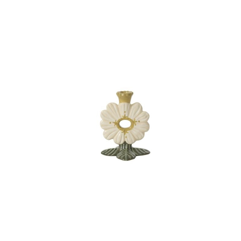 Decorative candle holder with floral design on a white background