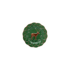 Decorative green plate with a deer design on a white background