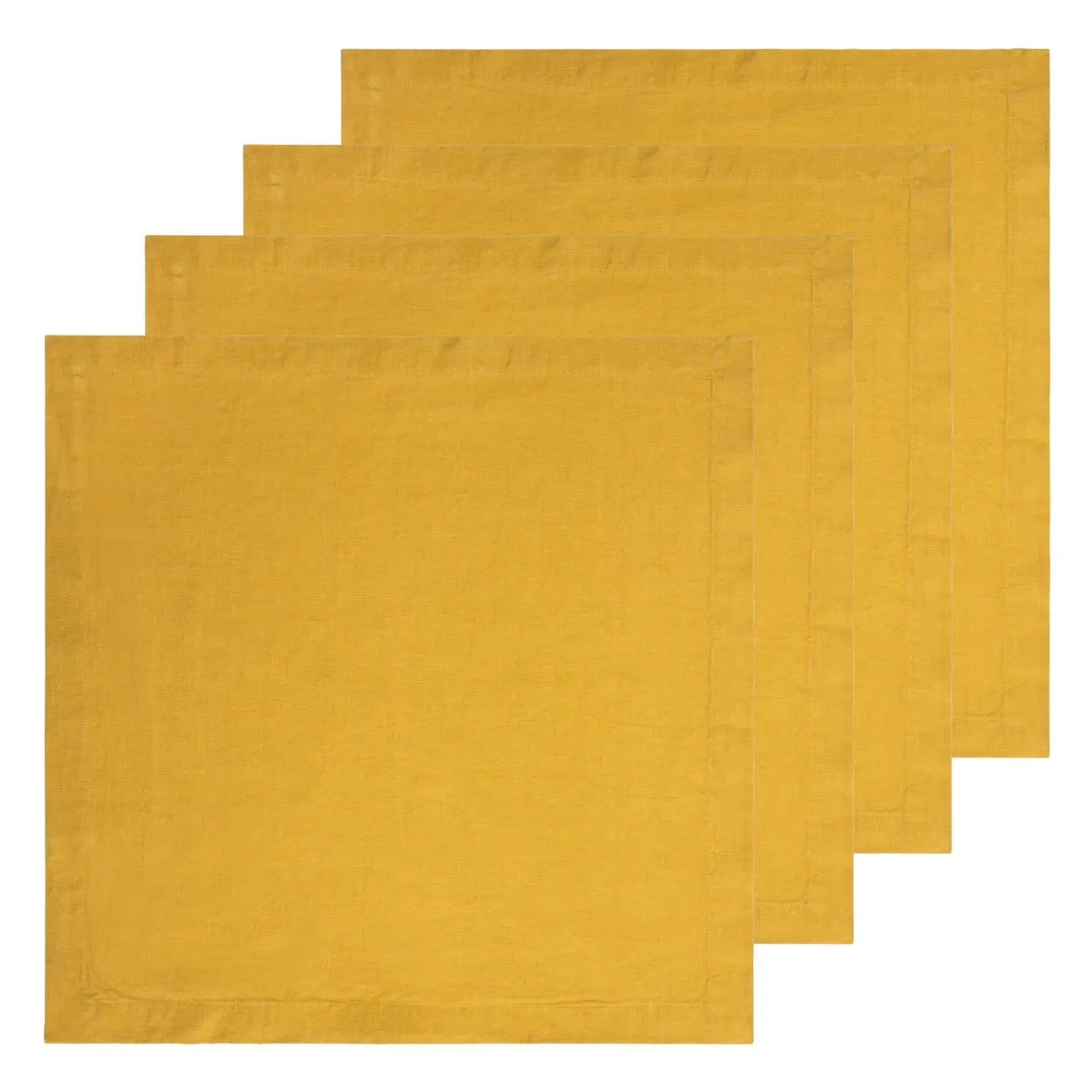 Set of three mustard yellow placemats on a white background