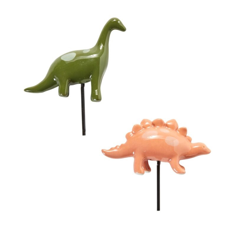 Two dinosaur figurines on sticks, one green and one orange, against a white background.