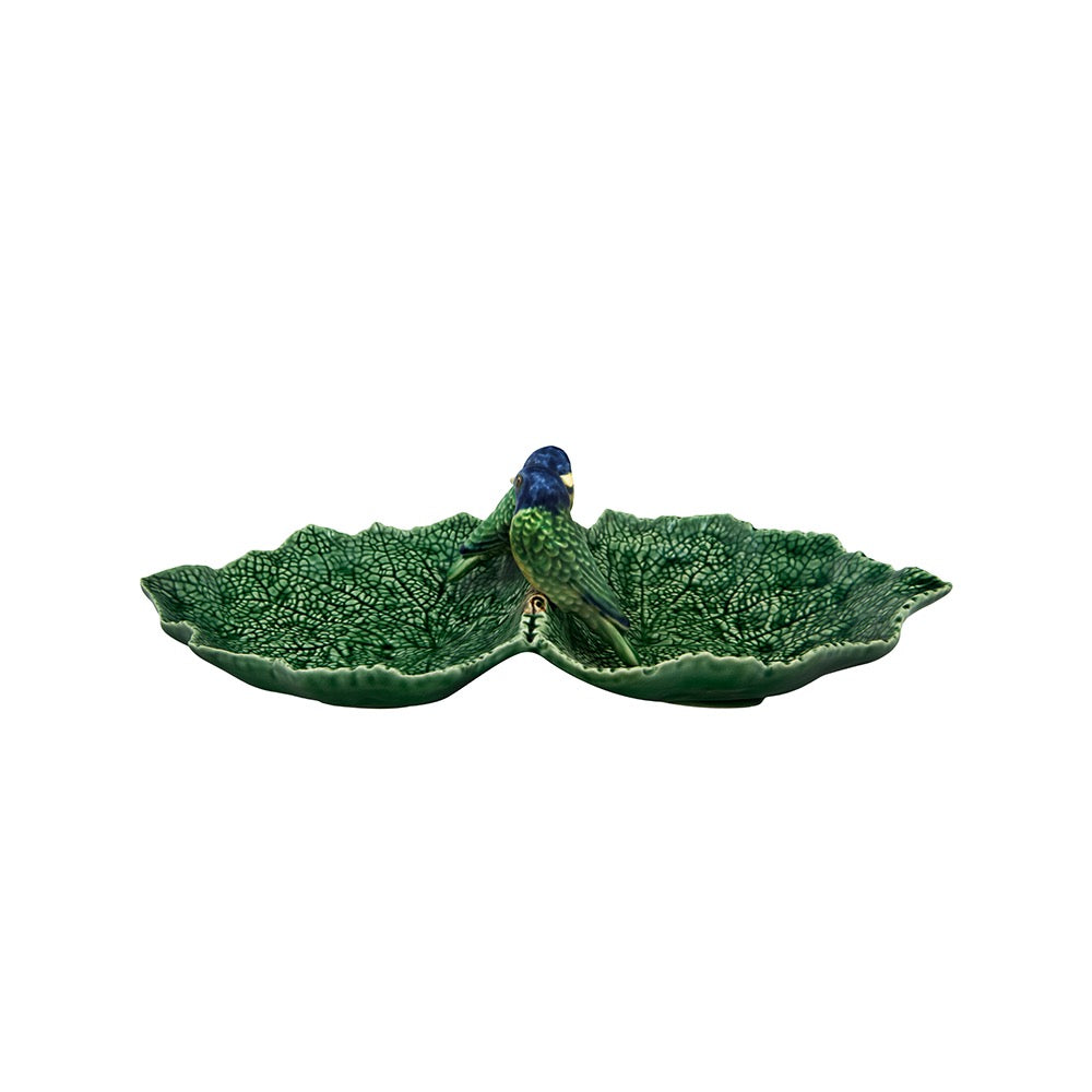 Decorative ceramic leaf-shaped dish with a bird on a white background