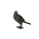 Black bird figurine on a white background