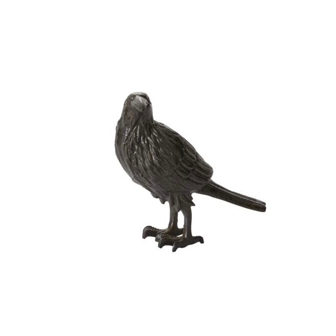 Black bird figurine on a white background