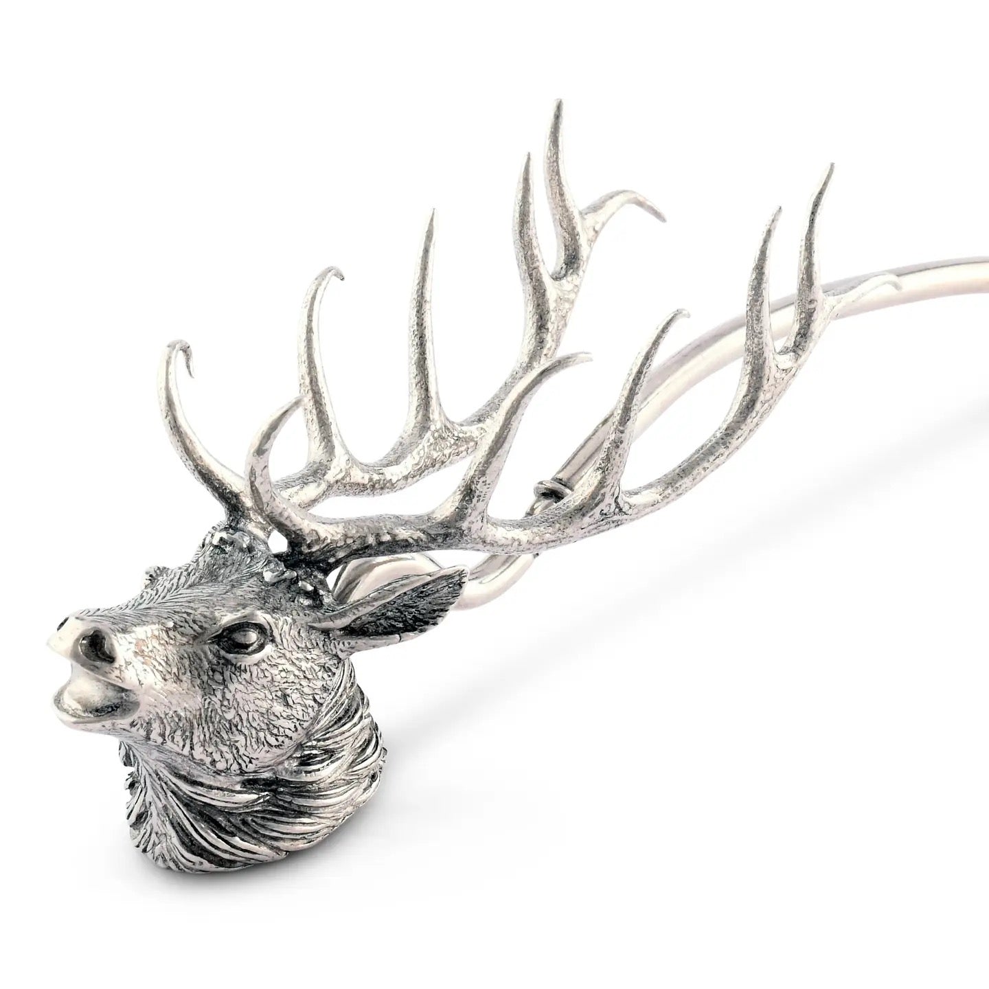 Silver deer head sculpture on a white background