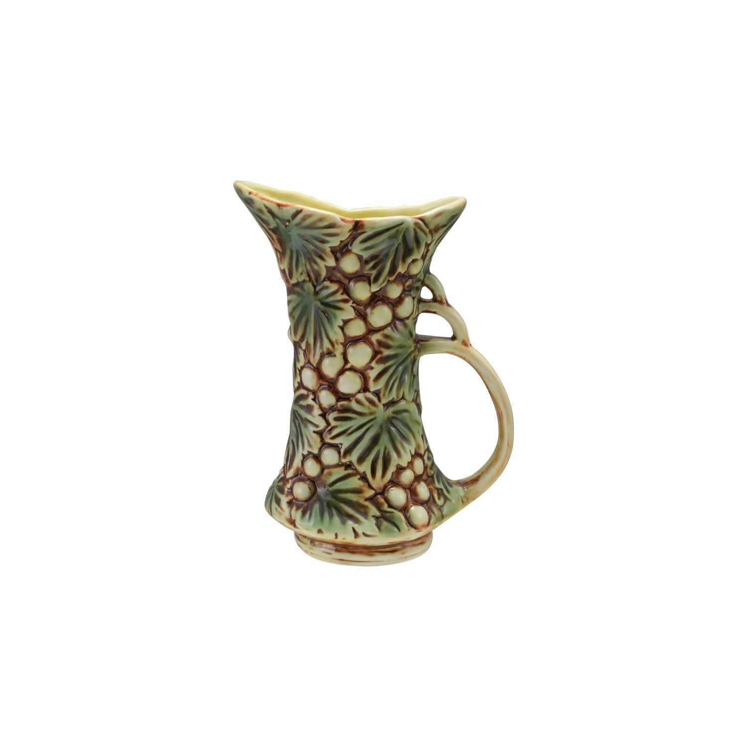 Ceramic pitcher with leaf pattern on a white background