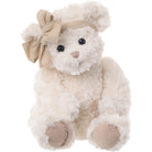 Plush teddy bear with a beige bow on a white background